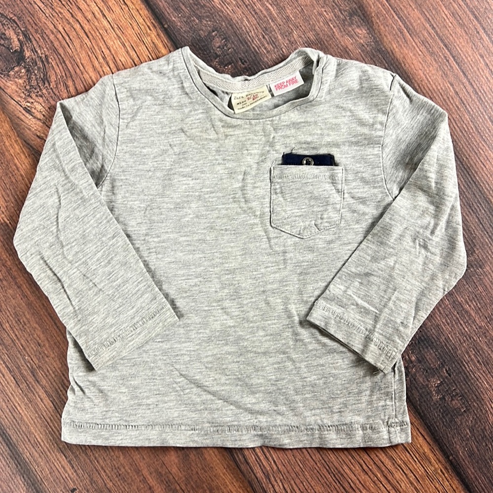 Zara 9-12 month gray long sleeve t shirt with blue pocket accent